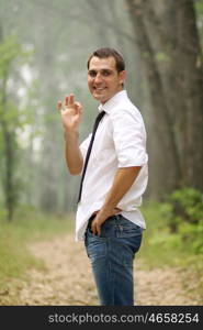 Portrait of young attractive man, outdoors