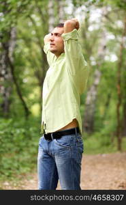 Portrait of young attractive man, outdoors