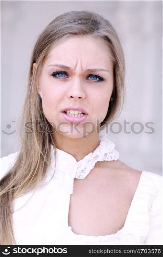 Portrait of young beautiful blond girl