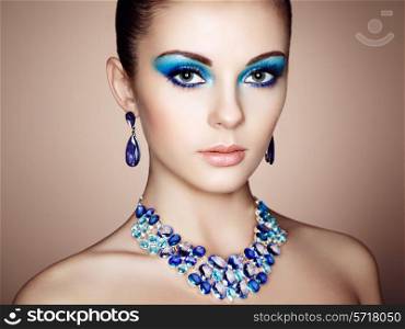 Portrait of young beautiful woman close up. Perfect makeup. Perfect skin. Fashion photo