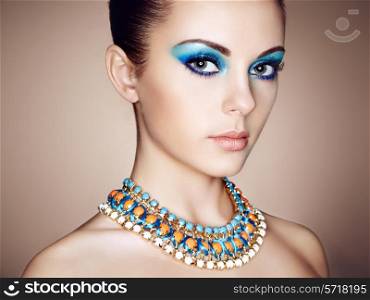 Portrait of young beautiful woman close up. Perfect makeup. Perfect skin. Fashion photo