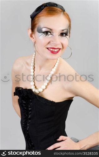 portrait of young beautiful woman in black dress