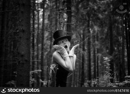 Portrait of young beautiful woman in the forest