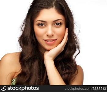Portrait of young beautiful woman with hand