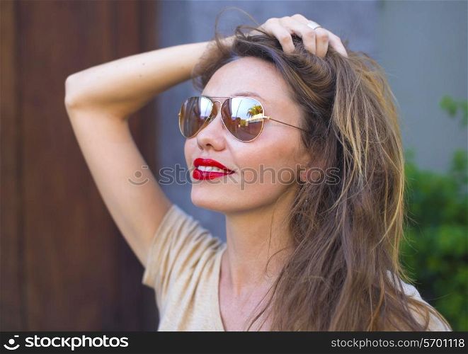 Portrait of Young Beautiful Woman with Red Lips
