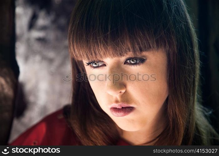 Portrait of young beauty worried woman