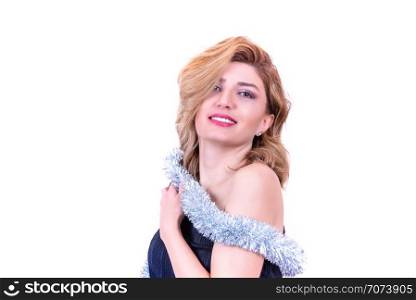 Portrait of young blonde attractive woman in silver tinsel with isolated on white background. Merry Christmas and New Year theme. Party time