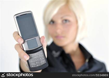 portrait of young blonde business woman holding new modern cellphone