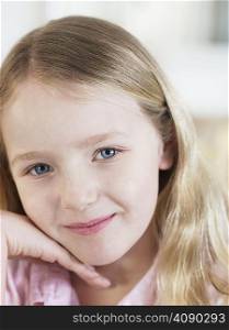 Portrait of young blue-eyed blonde girl