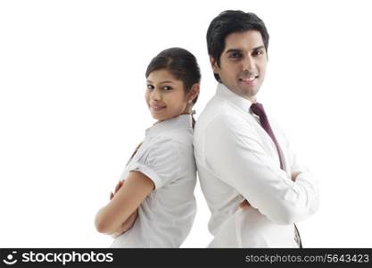 Portrait of young business coworker standing back to back over white background