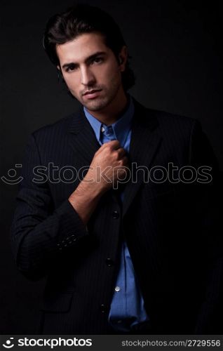 portrait of young business man wearing blazers