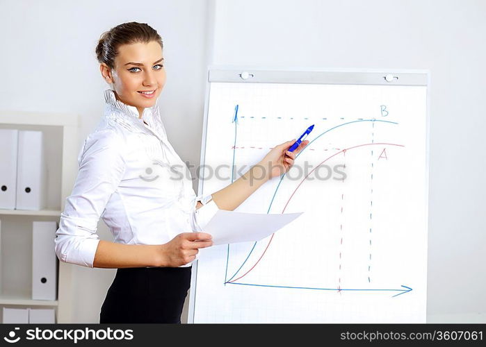 Portrait of young business woman in office