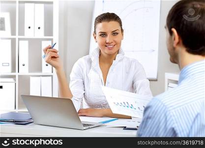 Portrait of young business woman in office