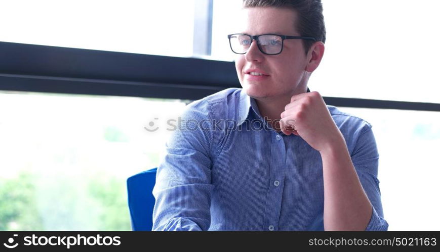 portrait of young businessman at startup office