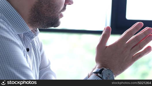 portrait of young businessman at startup office