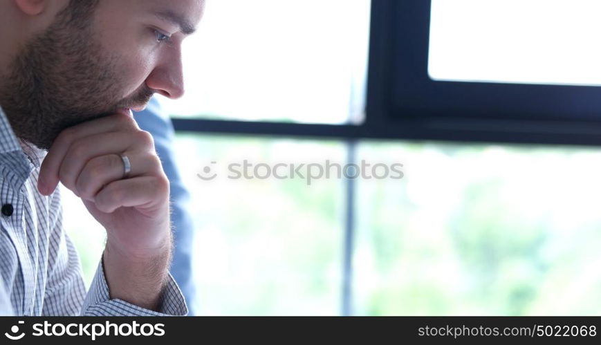 portrait of young businessman at startup office