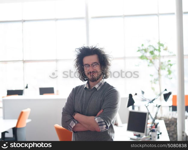 portrait of young businessman at startup office