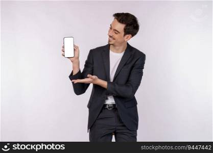 Portrait of young businessman holding smartphone cellphone blank screen with mockup copy space isolated white background. Showing advert, using online application concept.