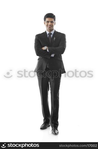 Portrait of young businessman in suit isolated over white background