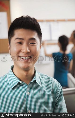 Portrait of young businessman in the office