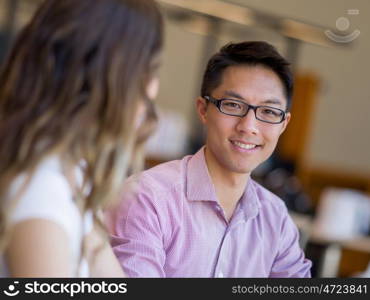 Portrait of young businessman. Portrait of young businessman standing in office