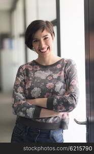 portrait of young businesswoman in casual hipster clothes at modern startup business office interior