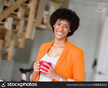 Portrait of young businesswoman in office. Portrait of young businesswoman