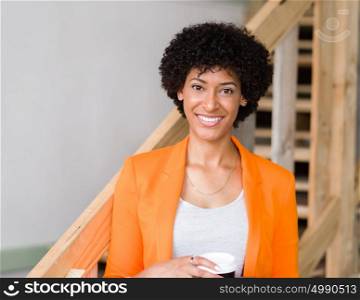 Portrait of young businesswoman in office. Portrait of young businesswoman