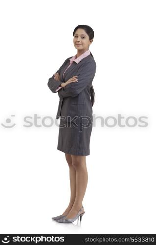 Portrait of young businesswoman in suit isolated over white background