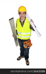 portrait of young carpenter holding steel post and blueprints isolated on white