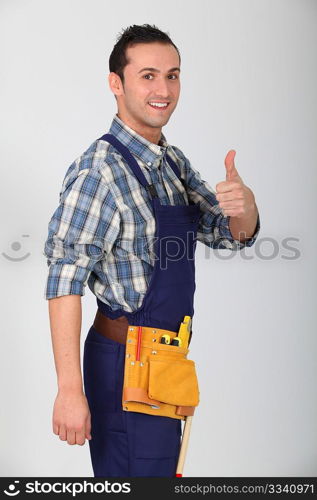 Portrait of young carpenter on white background