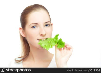 Portrait of young cheerful woman with lettuce leaf