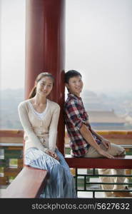 Portrait Of Young Chinese Couple In Jing Shan Park
