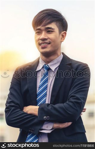 Portrait of young confident Asian businessman. Business concept.