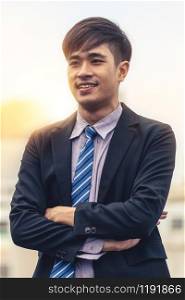 Portrait of young confident Asian businessman. Business concept.