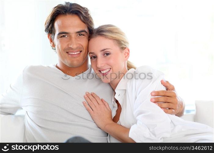 Portrait of young couple at home