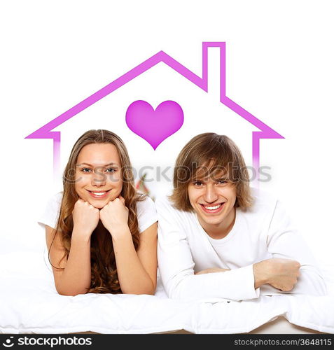 Portrait of young couple in white with heart symbols