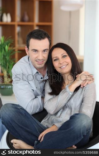portrait of young couple posing at home