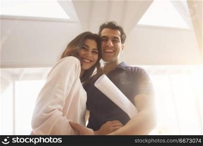 Portrait of young couple smiling
