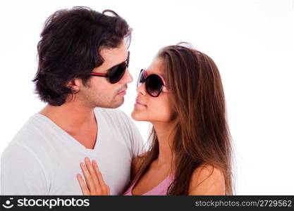 portrait of young couple with sunglasses on isolated white background
