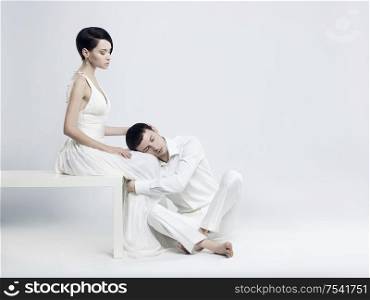 Portrait of young elegant couples in the tender passion