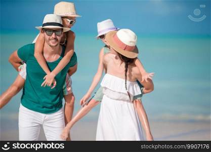 Portrait of young family on vacation have a lot of fun. Young family on vacation have a lot of fun