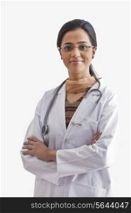 Portrait of young female doctor with stethoscope around neck isolated over white background