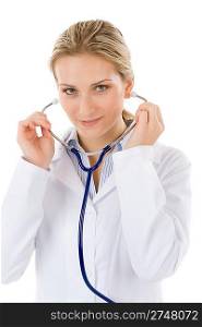 Portrait of young female doctor with stethoscope on white