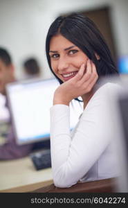 portrait of young female student at school classroom