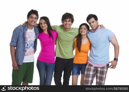 Portrait of young friends in casuals standing together isolated over white background