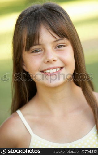 Portrait Of Young Girl In Park