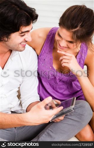 portrait of young girl listening her boyfriend deeply