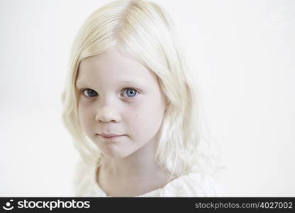 Portrait of young girl looking to camera