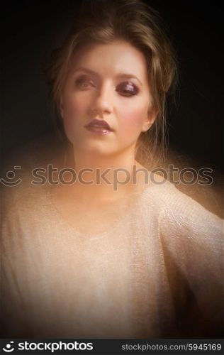 Portrait of young girl on grey background